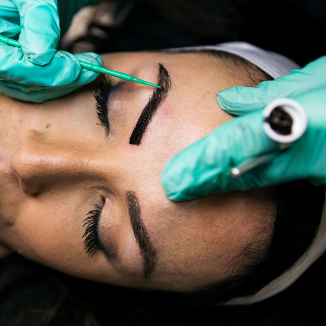 Image of woman getting brow tinting