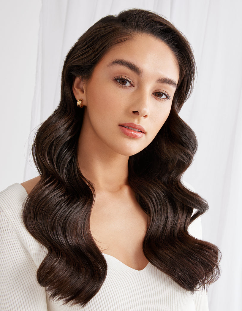 model with thick dark wavy hair